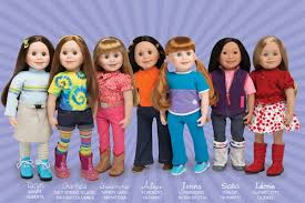 7 Maplelea Girl dolls standing in a row